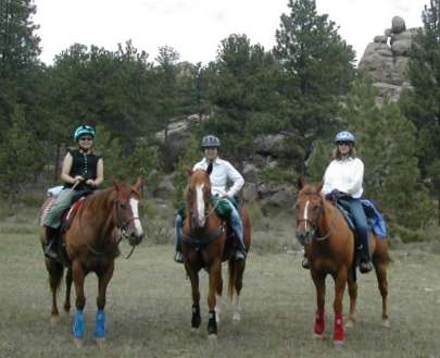 Kaitlin, Alexine and Chris riding in Colorado