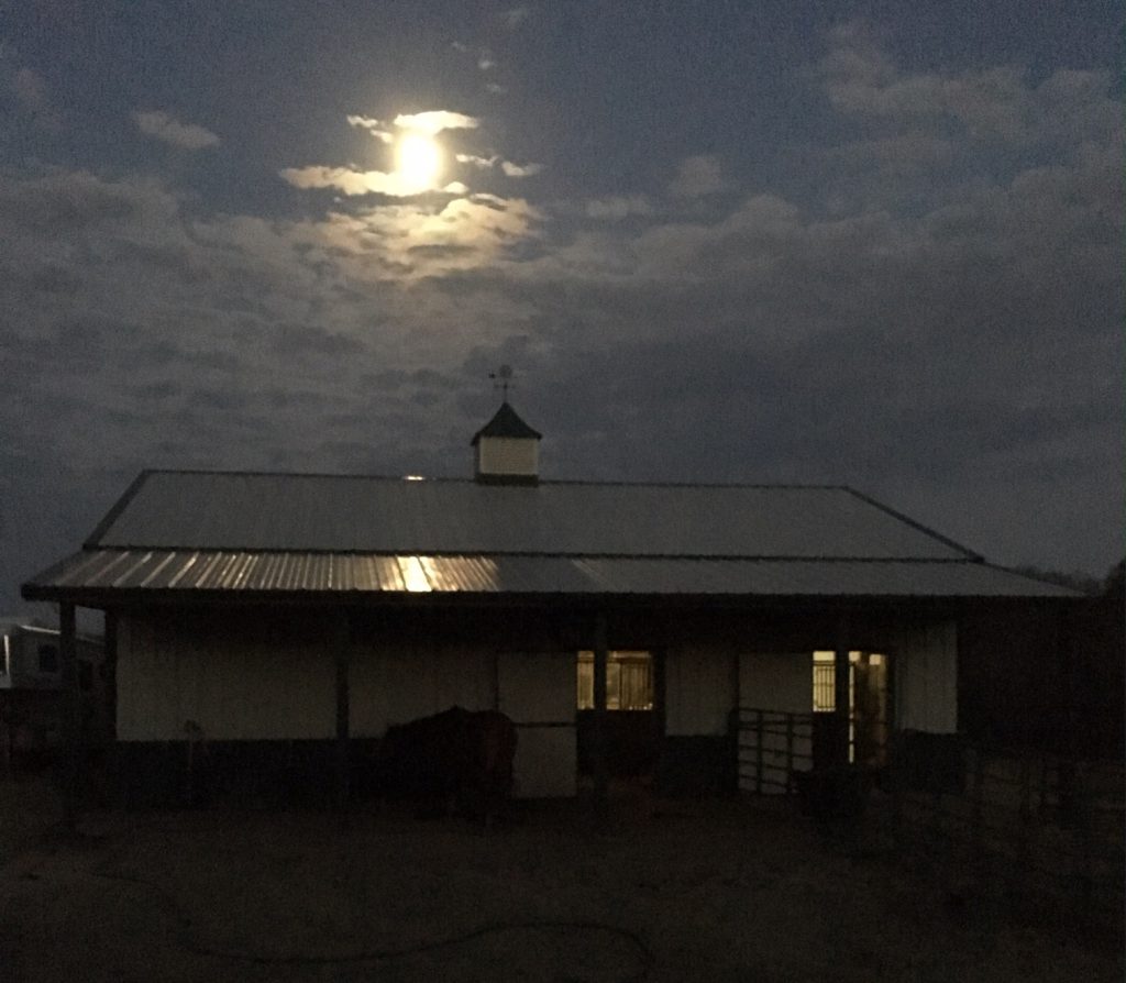 barn with moon overhead