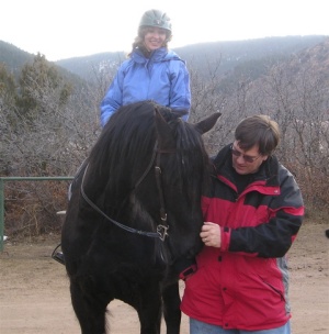 Family Friesian horse