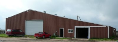 Arena with stalls under one roof