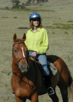 woman riding english horse