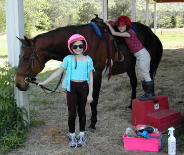 girls riding gentle horse